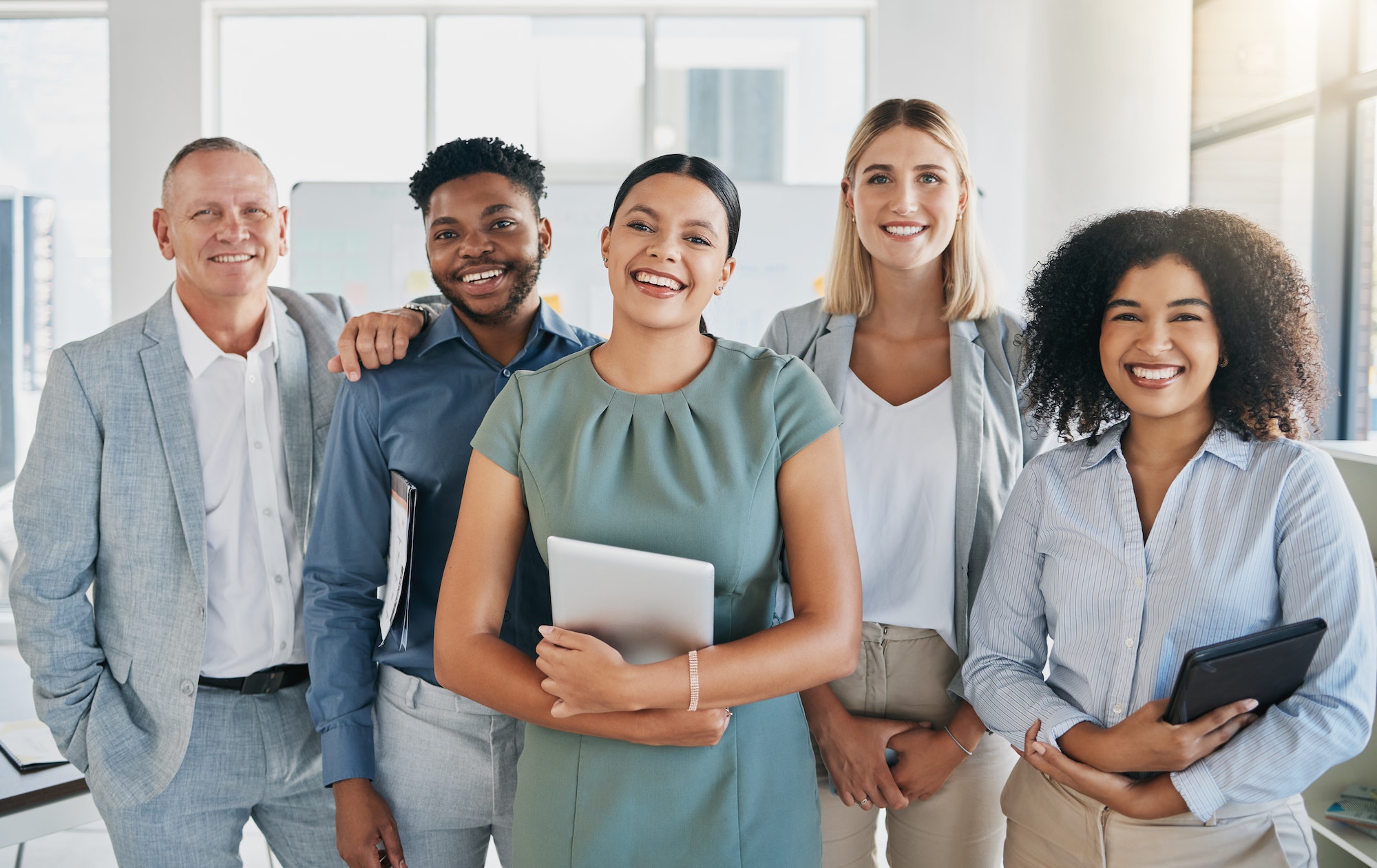 portrait-happy-or-business-people-in-a-digital-agency-in-an-office-building-with-motivation-goals.jpg